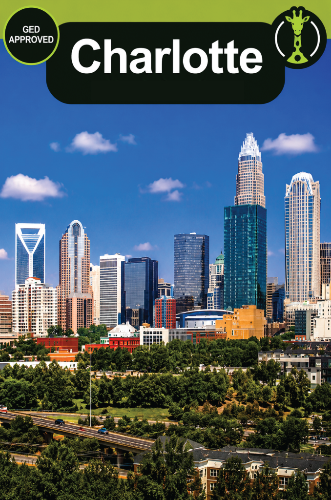 The uptown Charlotte, North Carolina skyline at dusk on a clear evening.