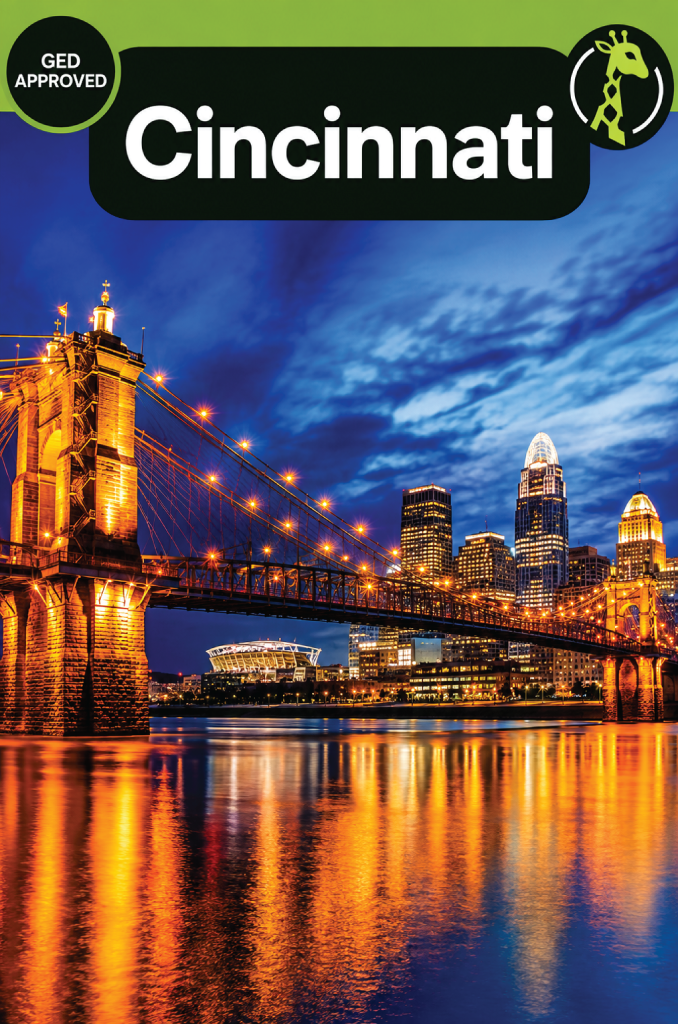 The Cincinnati skyline and the Roebling Suspension Bridge over the Ohio River on a clear day.