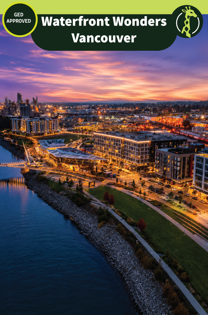 The Vancouver, Washington waterfront at sunset: a lit riverside promenade and new apartment blocks along the Columbia River, with a cable-stayed pier reaching out over the water.
