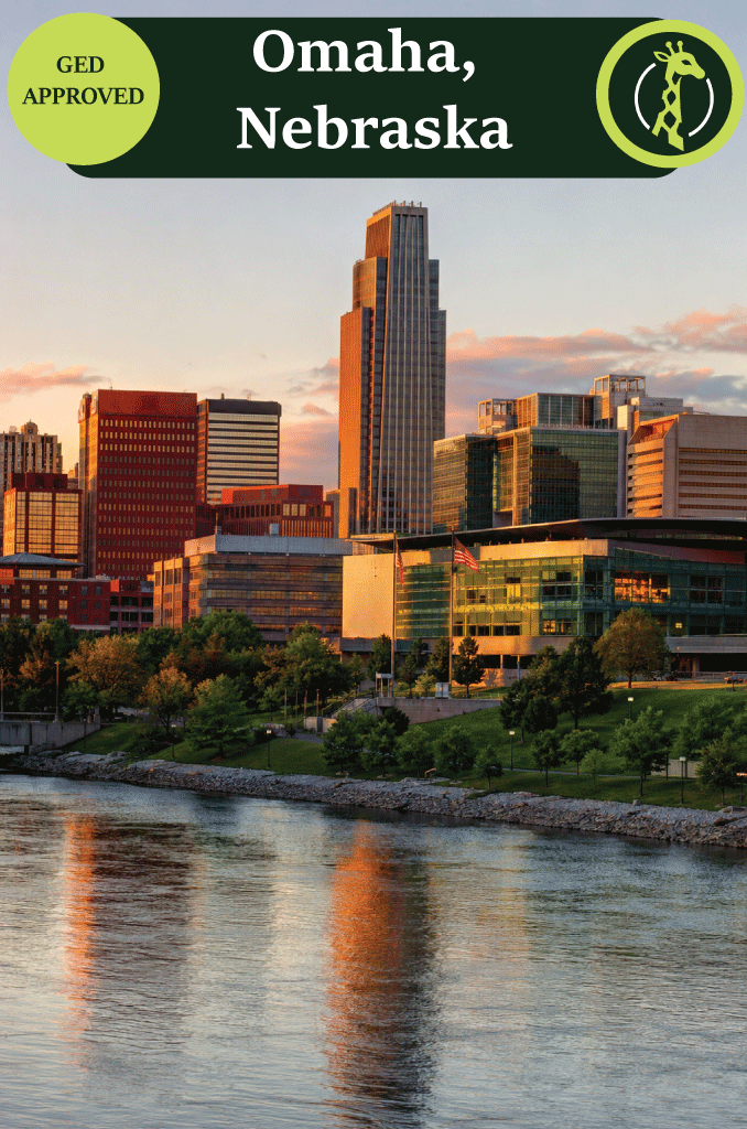 The Omaha skyline along the Missouri River at dusk.
